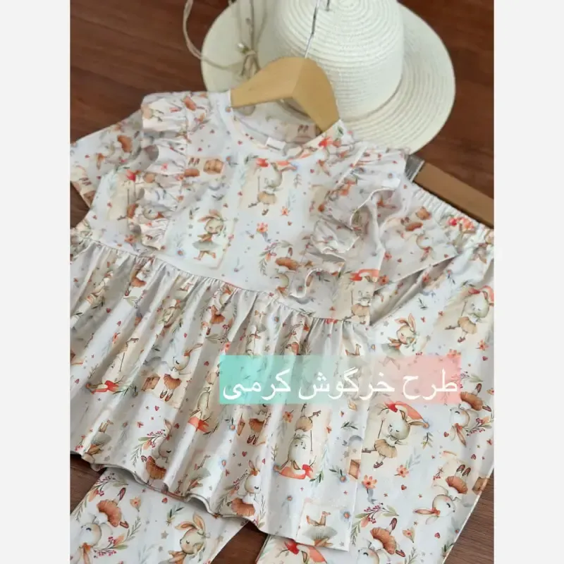 ست بلوز و شلوار راحتی دخترانه پنبه یک رو لاکرا مدل خرگوش کرم سایز 40 تا 60