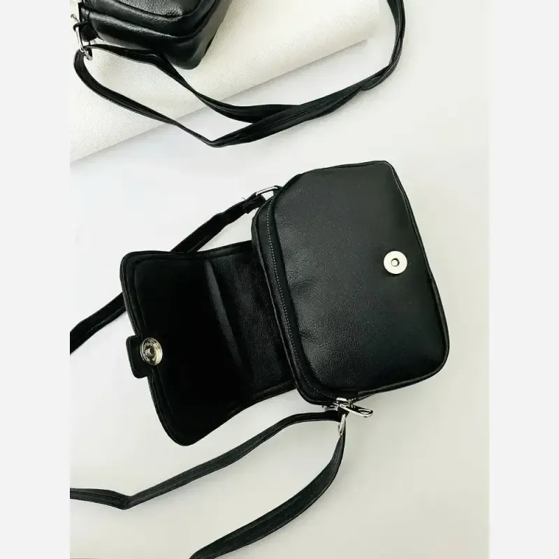 کیف زنانه نیسا جنس شرانگ ریز سه جیب رنگ مشکی
