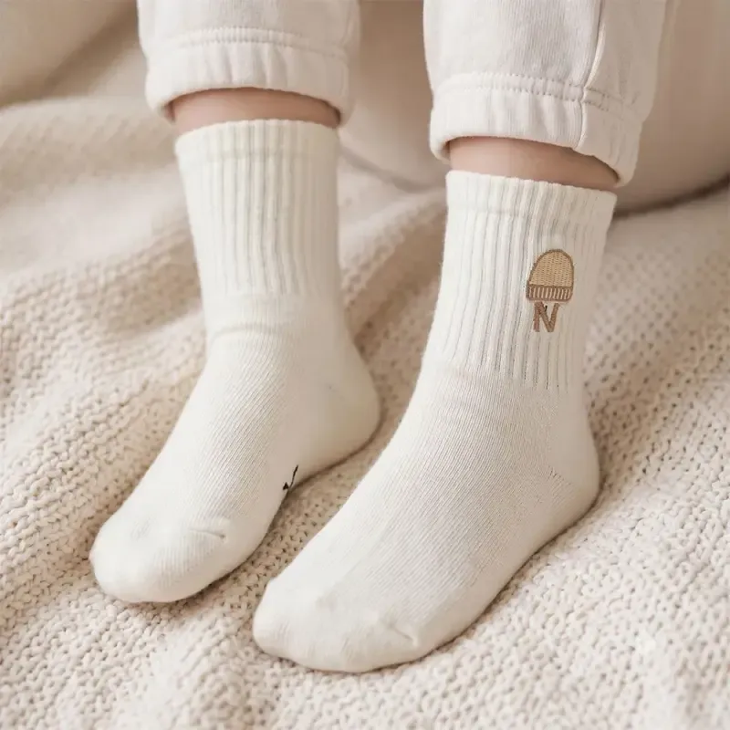 جوراب بچه گانه ساق بلند پنبه ای رنگ شیری (تخفیف‌دار)